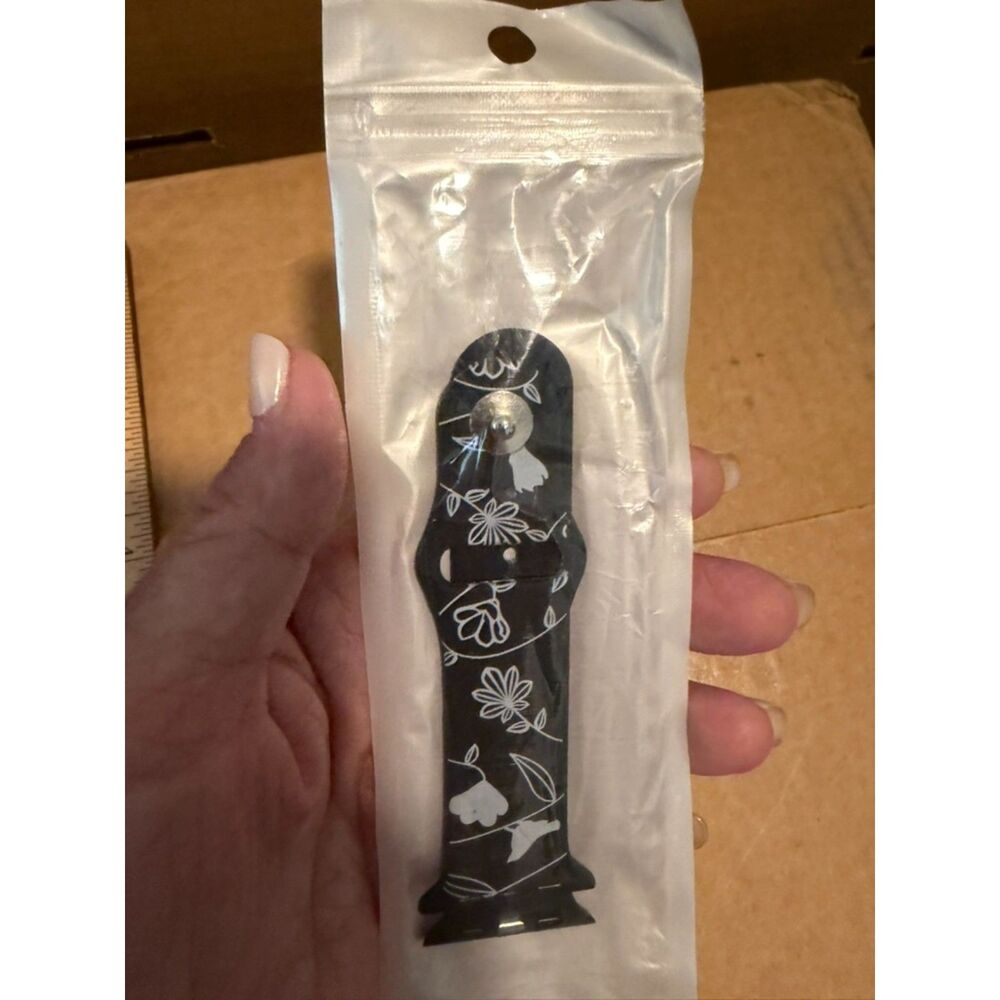 black with white floral design rubber apple watch band